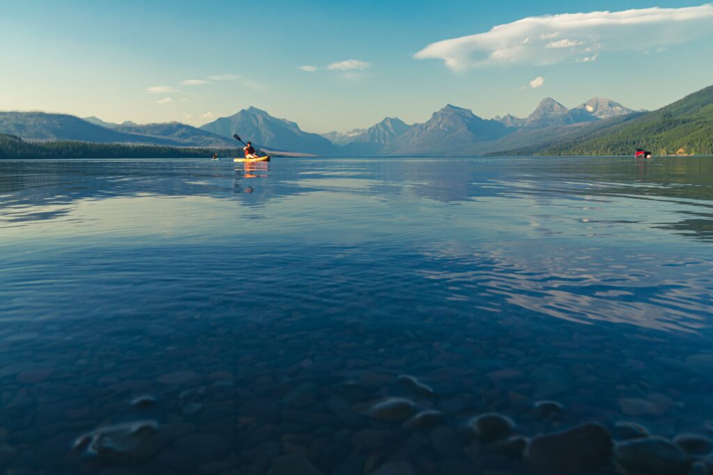 Kayaking Lake McDonald. Glacier Bear Cabin has extra perks when you stay with us at our 2 bedroom, 1 bath cabin at Apgar Village near Lake McDonald