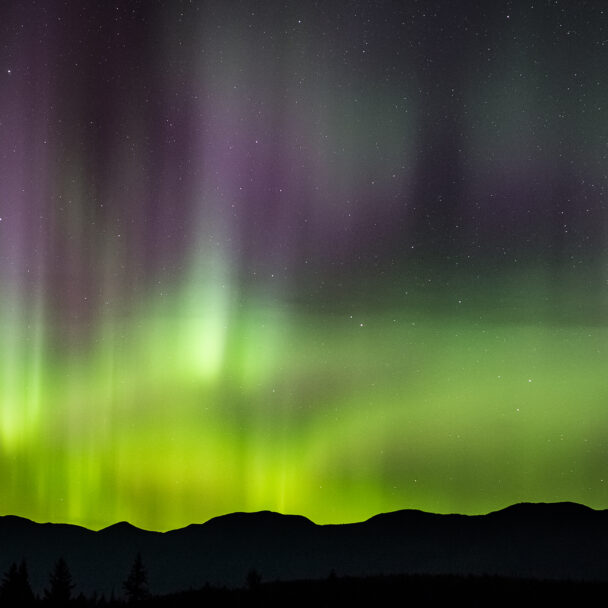 Aurora Borealis at Glacier National Park. Glacier Bear Cabin located inside Glacier National Park is a 2 bedroom 1 bathroom cottage located at Apgar Village, around the corner from Lake McDonald. Great amenities and the perfect location for your Montana visit.