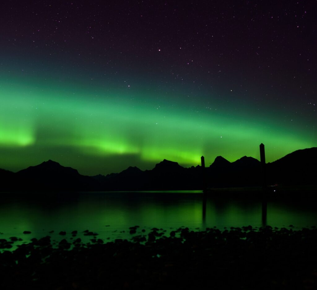 Northern Lights over Lake McDonald in GNP, Bring the Bear Spray you're hiking in GNP. Hiking in glacier national park. West Glacier Bear Cabin has extra perks when you stay with us at our 2 bedroom, 1 bath cabin at Apgar Village near Lake McDonald